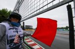 a-marshal-waves-the-red-flag.jpg