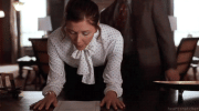 maggie-gyllenhaal-2002-secretary-v0-mwlqsu215r8b1.gif