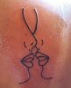 Lesbian-kissing-line-tattoo.jpg