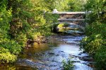 24770122-peace-stone-bridge-and-babbling-brook-flowing-towards-the-mighty-lake-superior-fort-w...jpg